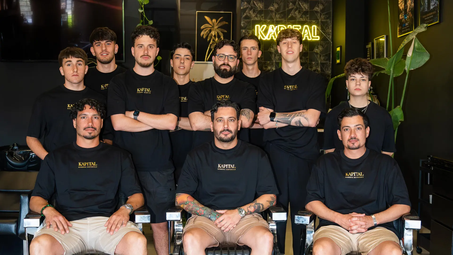 Il team di Kapital Barberia Sartoriale nella barberia